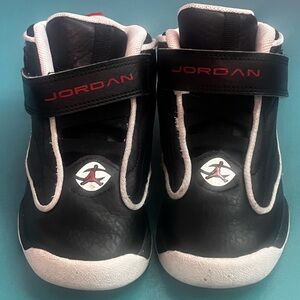Jordan Kids Black and White Sneakers with Red Accents